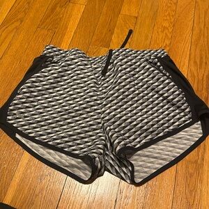 Under Armour Black and grey and white running shorts size M